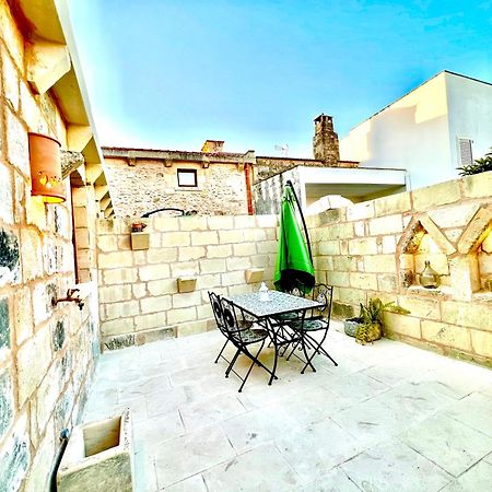 Corte Grika Martano Bagian luar foto